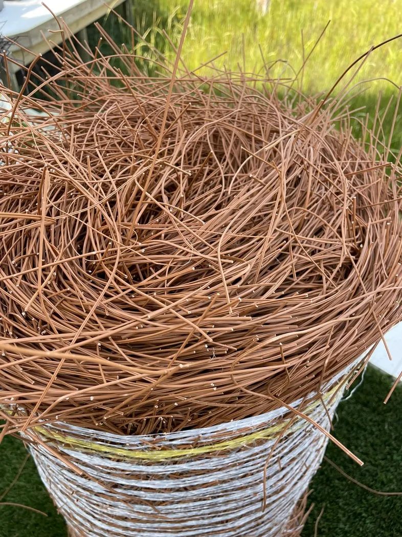 Synthetic pine straw roll close-up